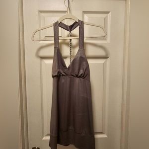Grey iridescent top with sliver chain in the back